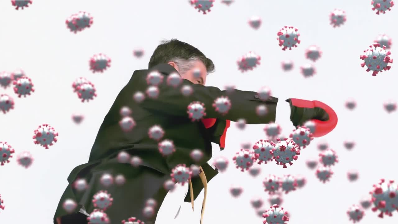 고위 백인 남자 권투 위에 떠다니는 바이러스 세포의 애니메이션