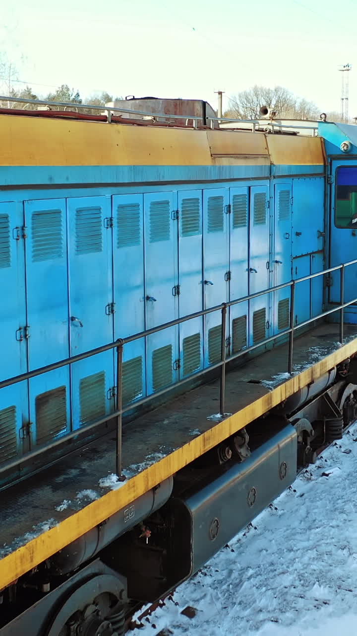 Container Freight Train in Station. Aerial view of cargo railway transportation industry. Vertical video