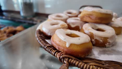 glazed donuts on a wicker tray