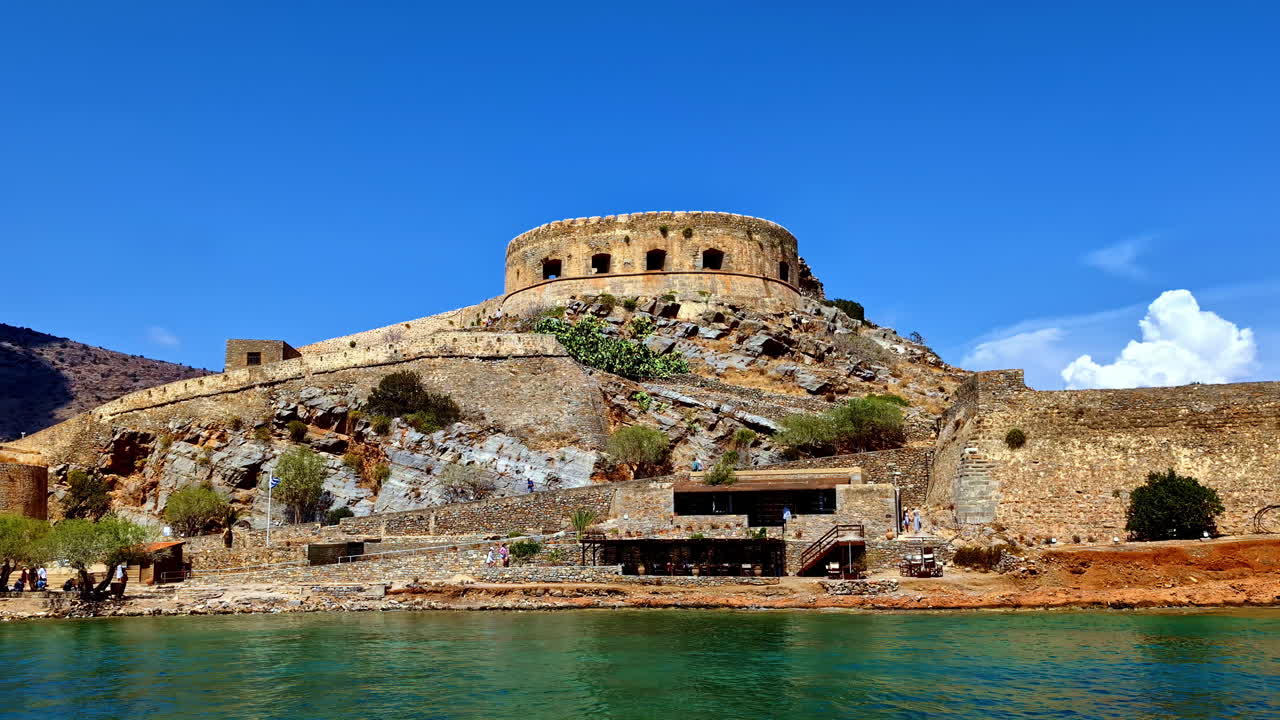 The abandoned fortress castle on the uninhabited Spinalonga Island, Crete, Greece - as seen from the Aegean Sea