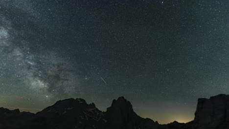 milkyway and starry night sky over rocky mountains at collado jermoso in picos de europa national park in leon, spain