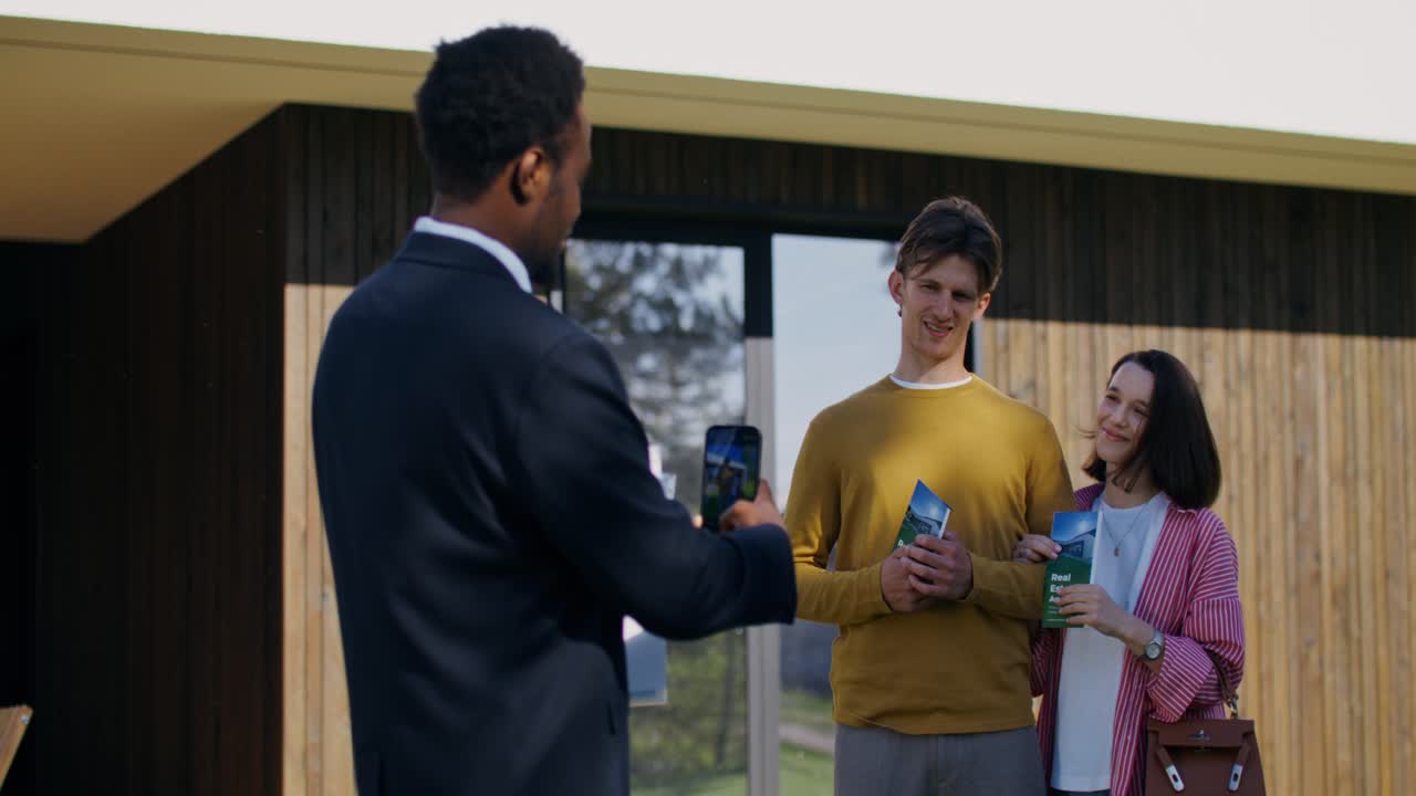 Real Estate Agent Showing Property to a Couple