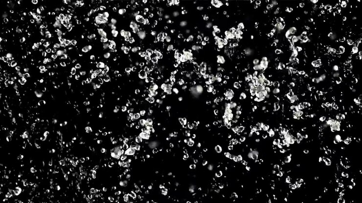 Slow Motion Water Droplets Splashing on Black Background