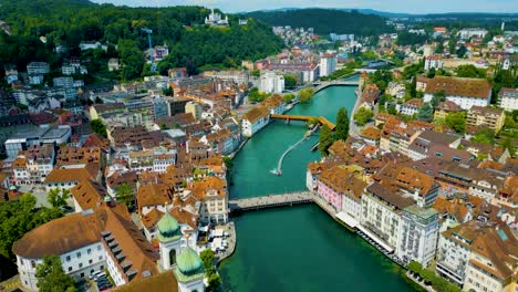 4K Drone Video of the Spreuerbrücke Bridge and Lucerne Needle Dam on the Reuss River near Lake Luzerne in Lucerne, Switzerland