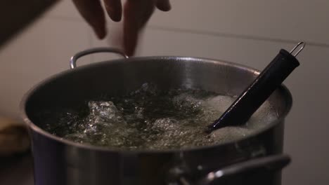 preparing syrup for dessert in a pot that