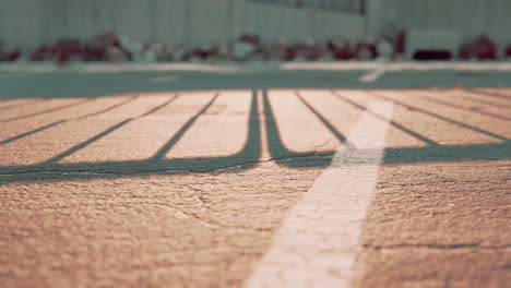 empty beach car park spaces covered in asphalt.