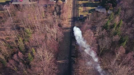 following the steam train in germany, chasing, aerial view of a railroad in oybin, near zittau