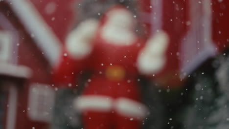 blurry christmas scene with santa claus and snow