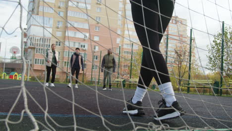 woman passing the ball to friends