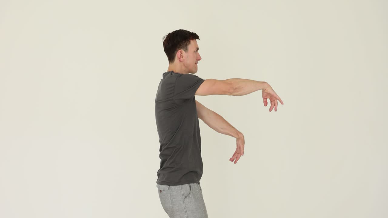 A man performing various arm movements and exercises