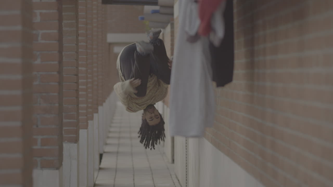 Man performing tricks in an urban alleyway