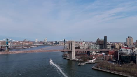 aerial footage of the east river near brooklyn bridge in new york city
