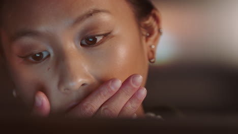 close up portrait beautiful asian woman using tablet computer watching movie laughing enjoying comedy entertainment relaxing at home