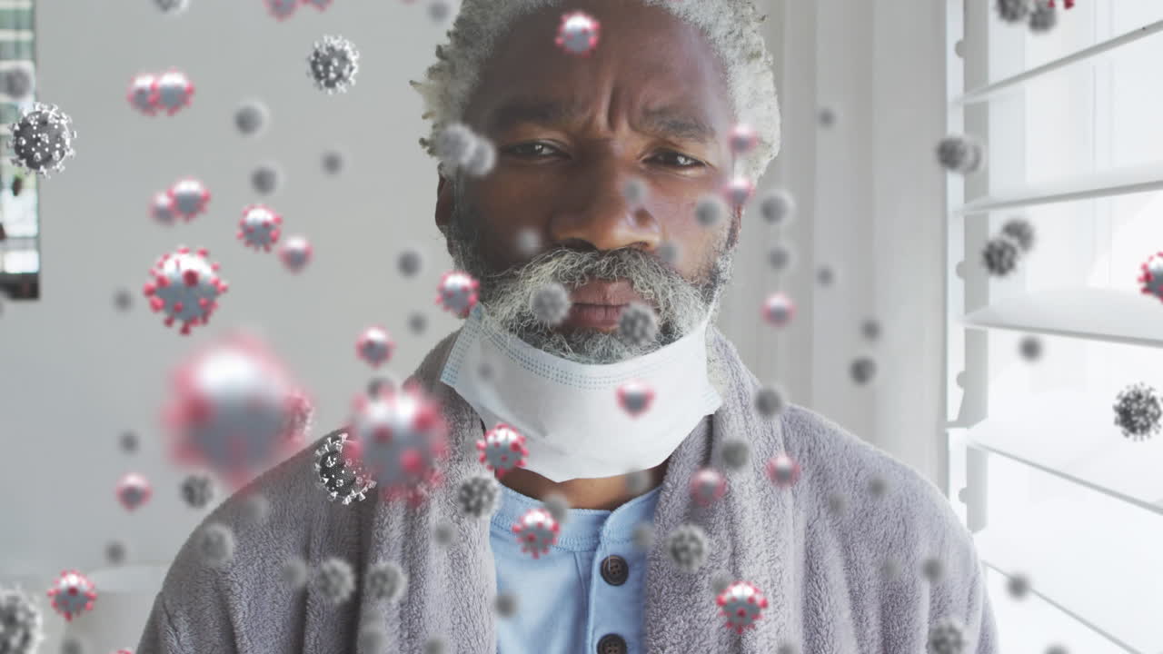 animación de células de virus sobre un paciente masculino afroamericano con máscara facial