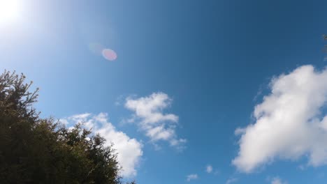 moving clouds on a blue sky