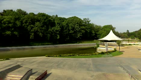 Aerial-Shot-Over-Skate-Park-Near-a-Lake