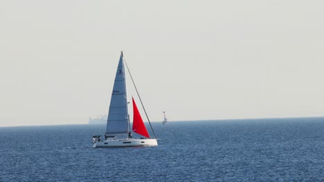 sailboat gliding across calm ocean waters