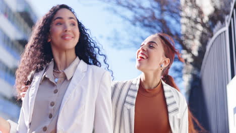 Women-friends,-shopping-and-hug-in-street