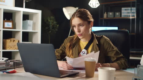 Portrait-of-confident-businesswoman-explaining-charts-on-video-call-in-office.