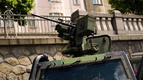 military vehicle with machine gun turret