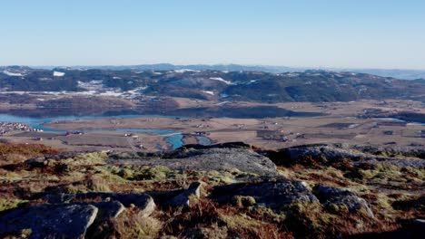 Mountain-Top-View-And-Blue-Lake-In-Blaheia,-Nordland-Norway--Aerial