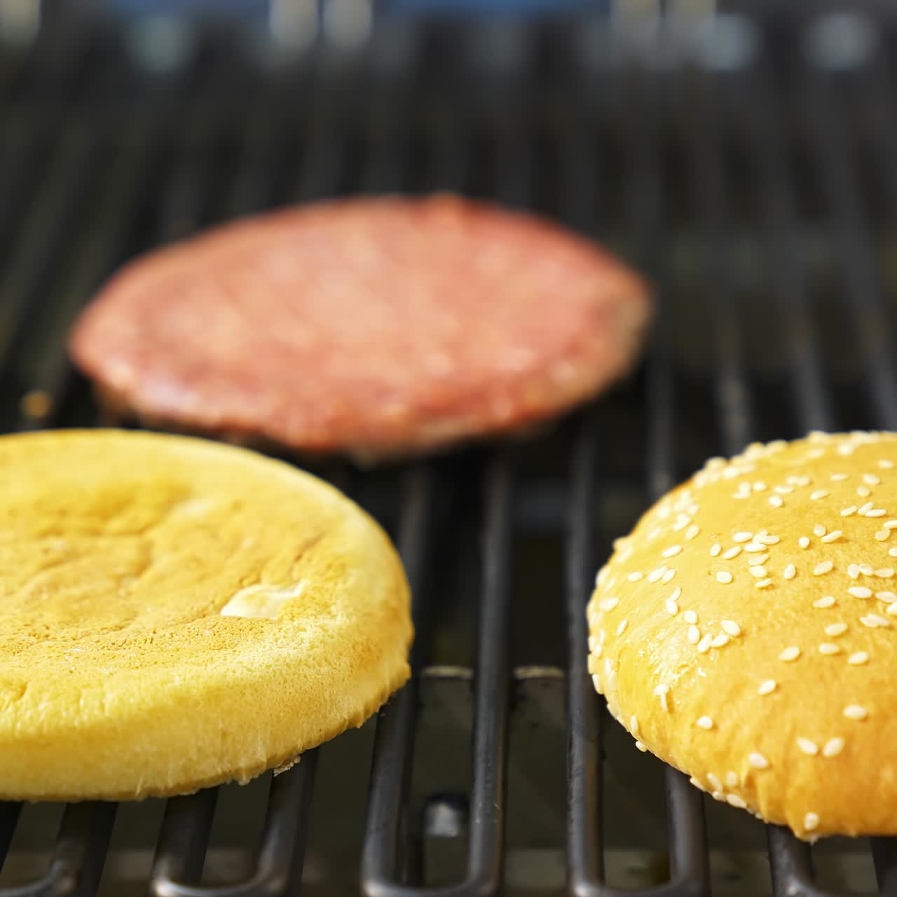 Chef cooking meat burger