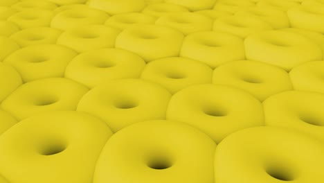 3d abstract yellow torus shapes background. 4k rendering loop animation.