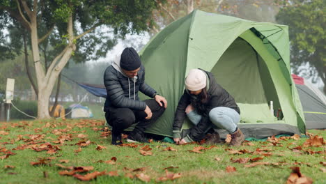 Camping,-tent-and-high-five-with-couple-in-nature