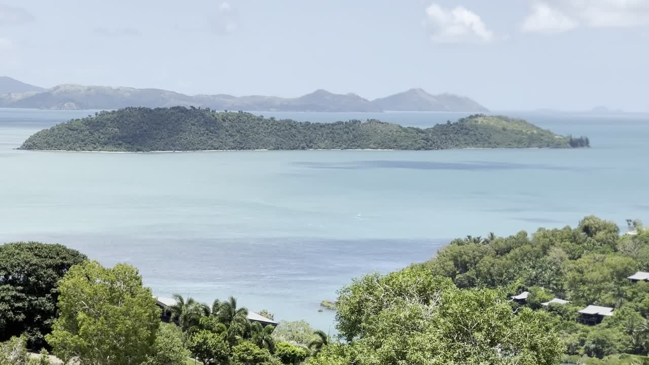 View to multiple Whitsunday tropical islands across Hamilton Island, Queensland, Australia