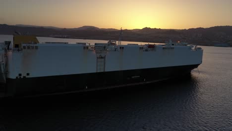 car carrier ship at sunset