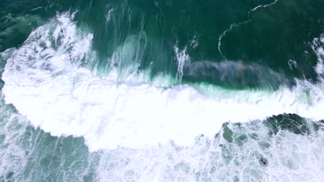 large powerful wave surges towards shore in atlantic