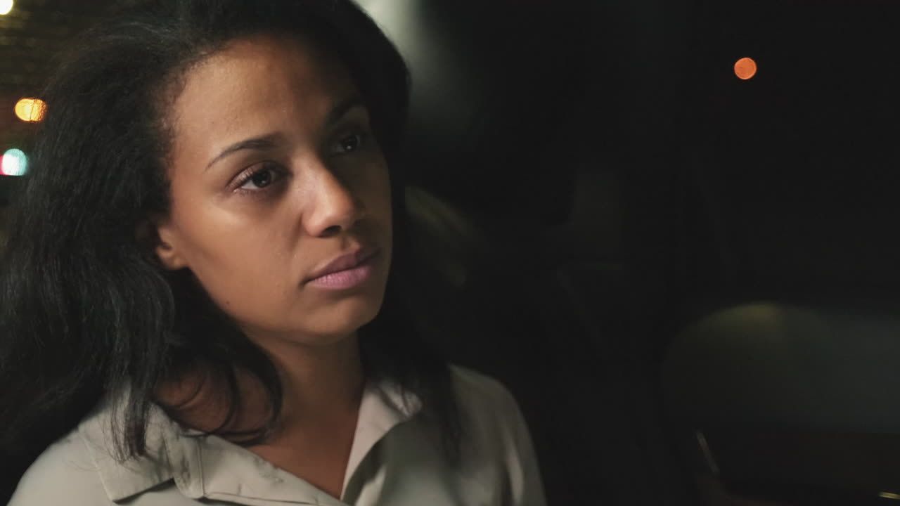 Mixed Race Woman In Taxi