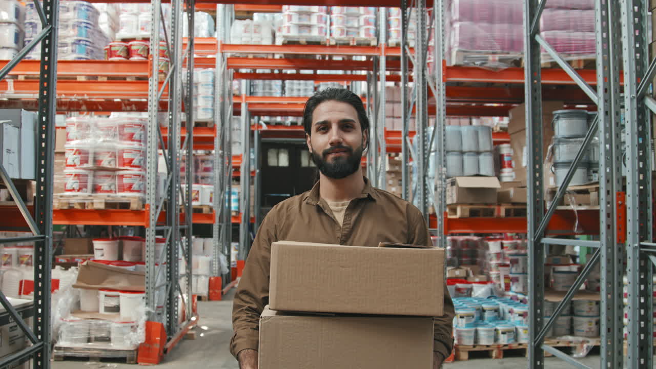Portrait of Male Worker Posing in Store Warehouse