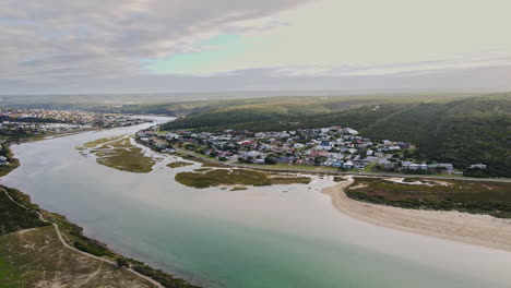 aerial view over goukou estuarine salt marsh of still bay east side at sunrise