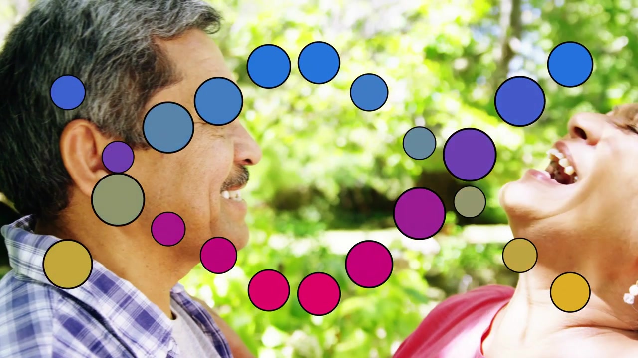 Senior couple leaning and laughing in garden, animated dots shifting across faces, promoting health