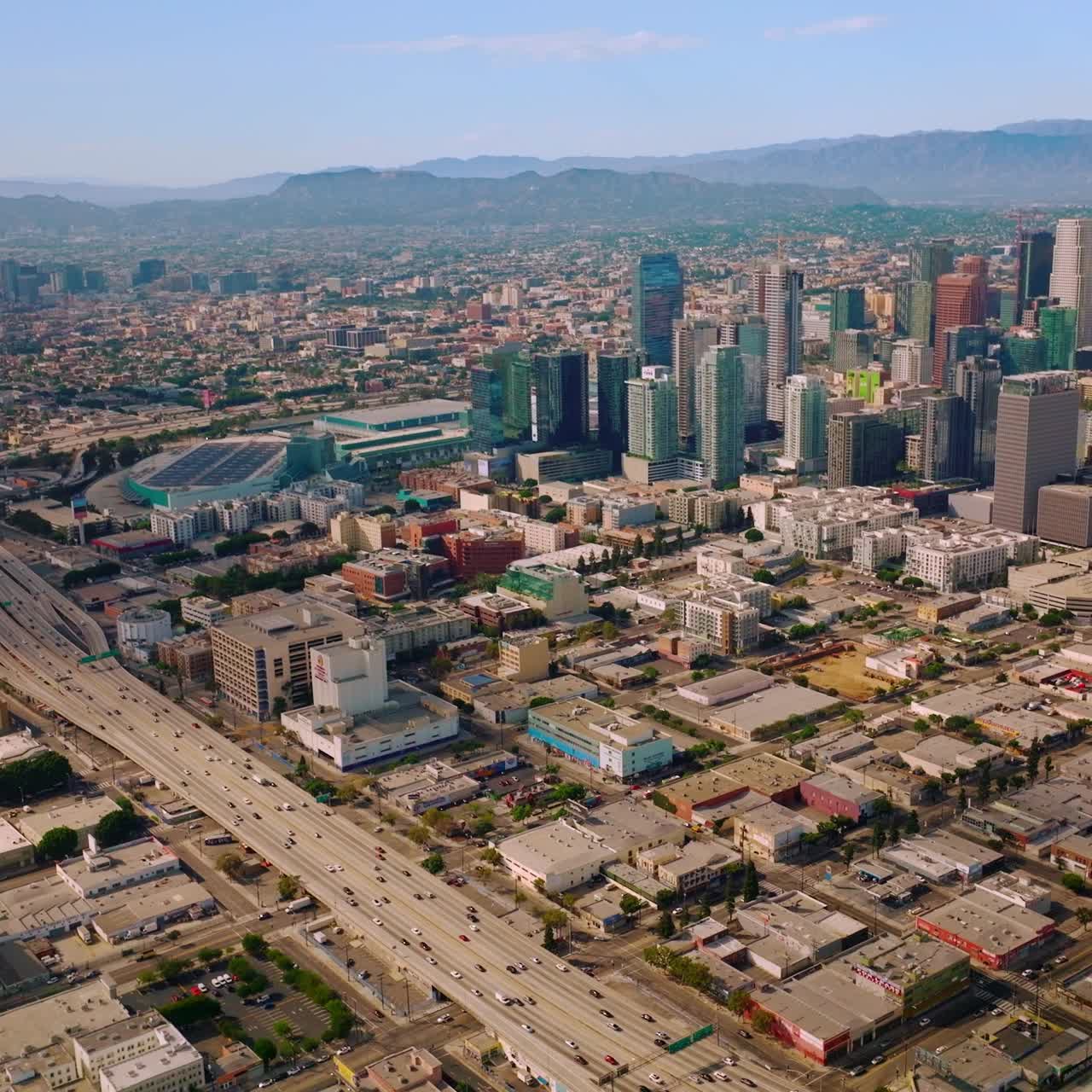 Sunny urban american city. Los-Angeles aerial shot with skyscrapes