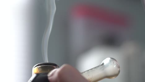 smoking cannabis pipe - close up