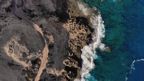 Rocky-coast-near-Porto-dos-Frades-on-Porto-Santo-island,-Madeira