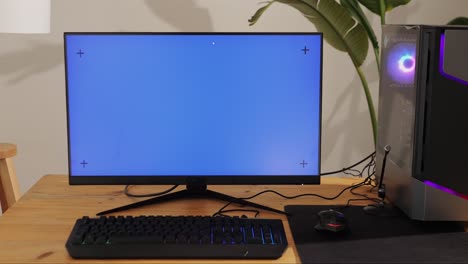Computer with chroma key green screen on monitor. Gamer man playing in popular video games. Programmer or hacker coding a code and working in networks, cyberspace. Digital software, mobile app development. Male specialist coding. Web design. High quality 4k footage
