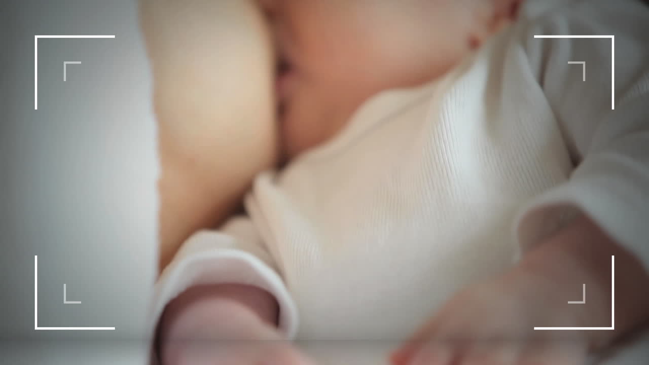 Animation of frame over caucasian mother talking to baby