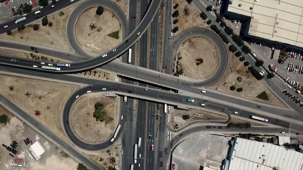 Cenital view of a road interchange in the metropolitan area of Mexico City, operating at the intersection of the Mexico-Queretaro highway and the road to Tepotzotlan