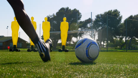 Soccer-player-kicking-the-ball-toward-the-goalpost-4k