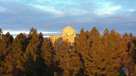 Durdevi-Stupovi-Monastery-Behind-Woods-At-Sunset-In-City-Of-Novi-Pazar,-Raska,-Serbia