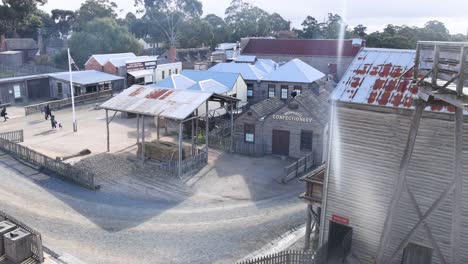 a historic town with people walking around