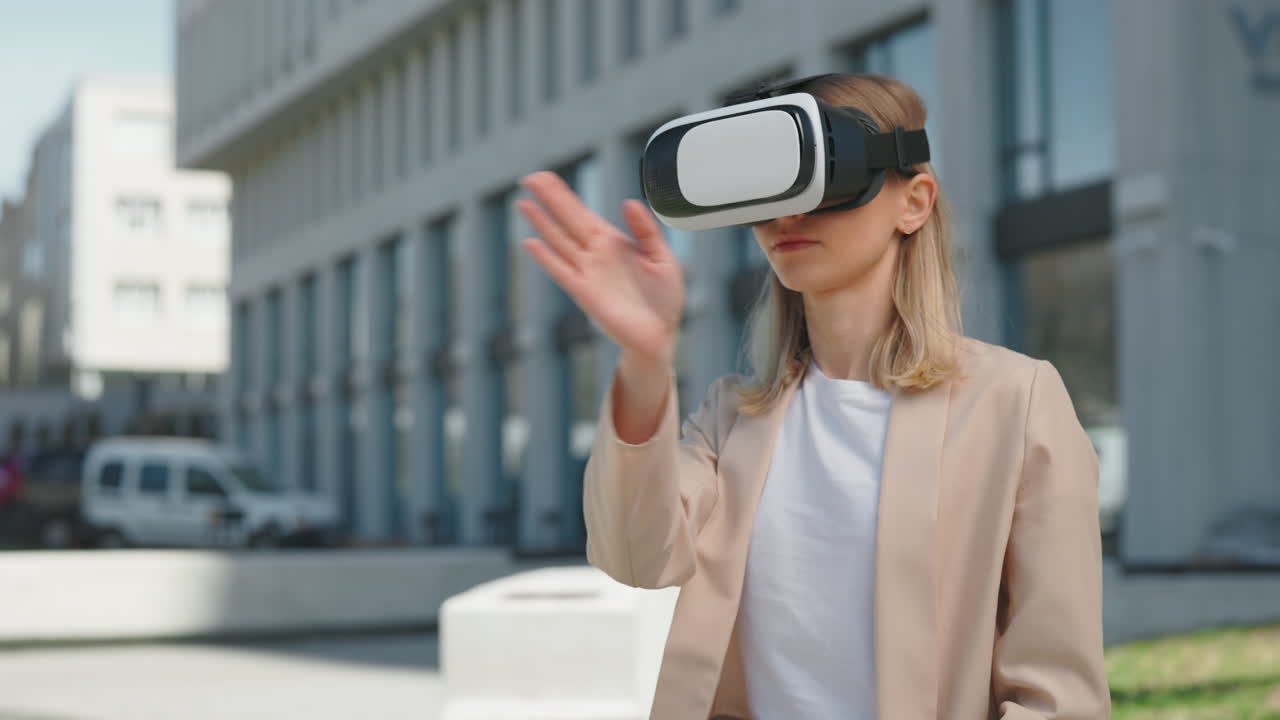 Young Woman Interacting with Virtual Reality Headset Outdoors