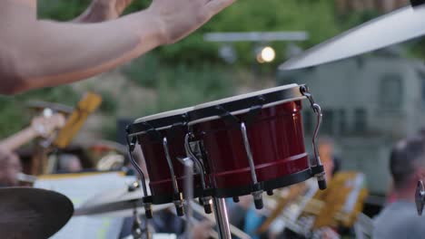 Drumer-plays-with-hands-on-two-Drums