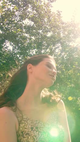 woman in a golden dress in a garden