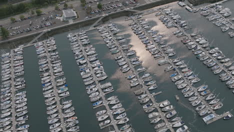 aerial side to side pan of a boat harbor in northern seattle, wa