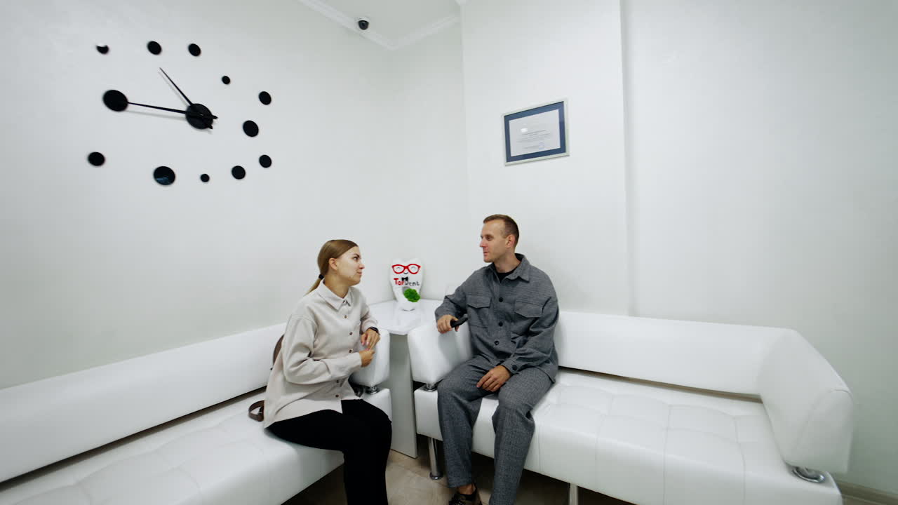 Modern Medical Office Waiting Room with Patients