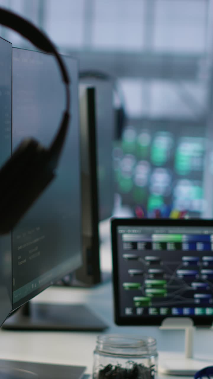 Vertical video Equipment in data center workplace used for monitoring performance